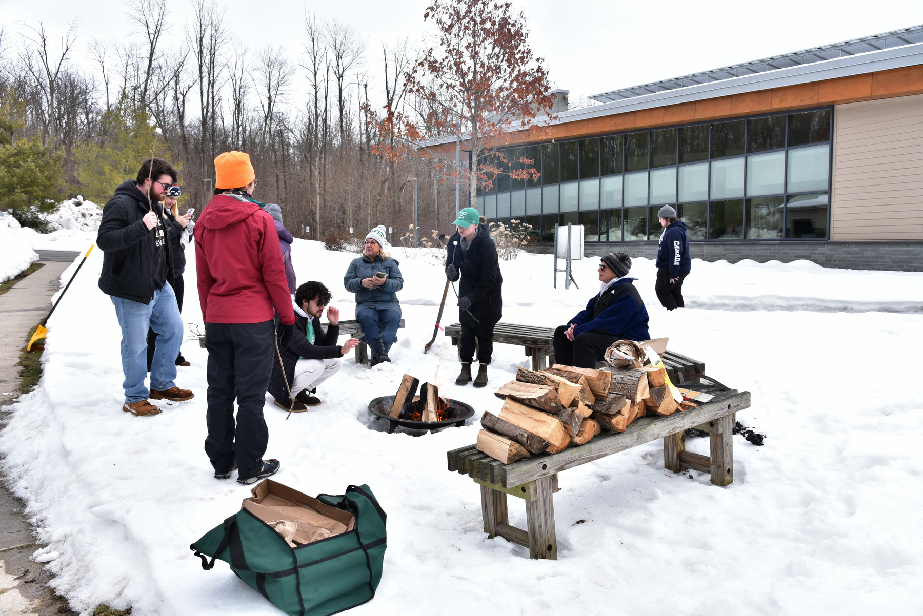 Students, faculty and staff took part in the "Fresh Air, Fresh Start" event at Rice Creek Field Station, including this group enjoying some s’mores and a campfire near the pavilion. 