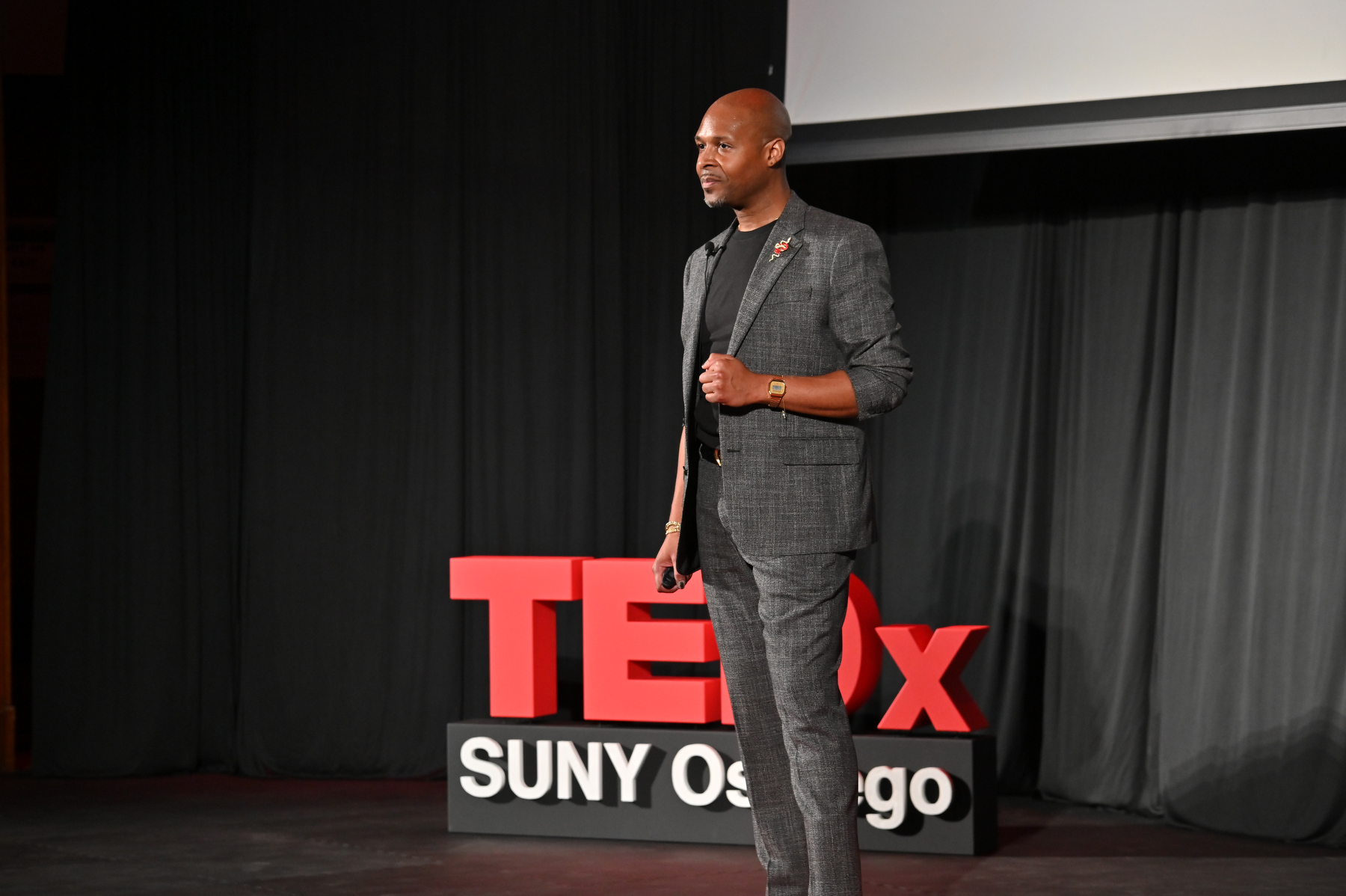 Speaking to the inaugural TEDxSUNY Oswego audience in Sheldon Hall ballroom April 11 is Aunrée Jacques Laurent Houston, marketing operations executive at Netflix, life enrichment coach and SUNY Oswego alumnus. His talk covered "The Ingredients of Purpose."