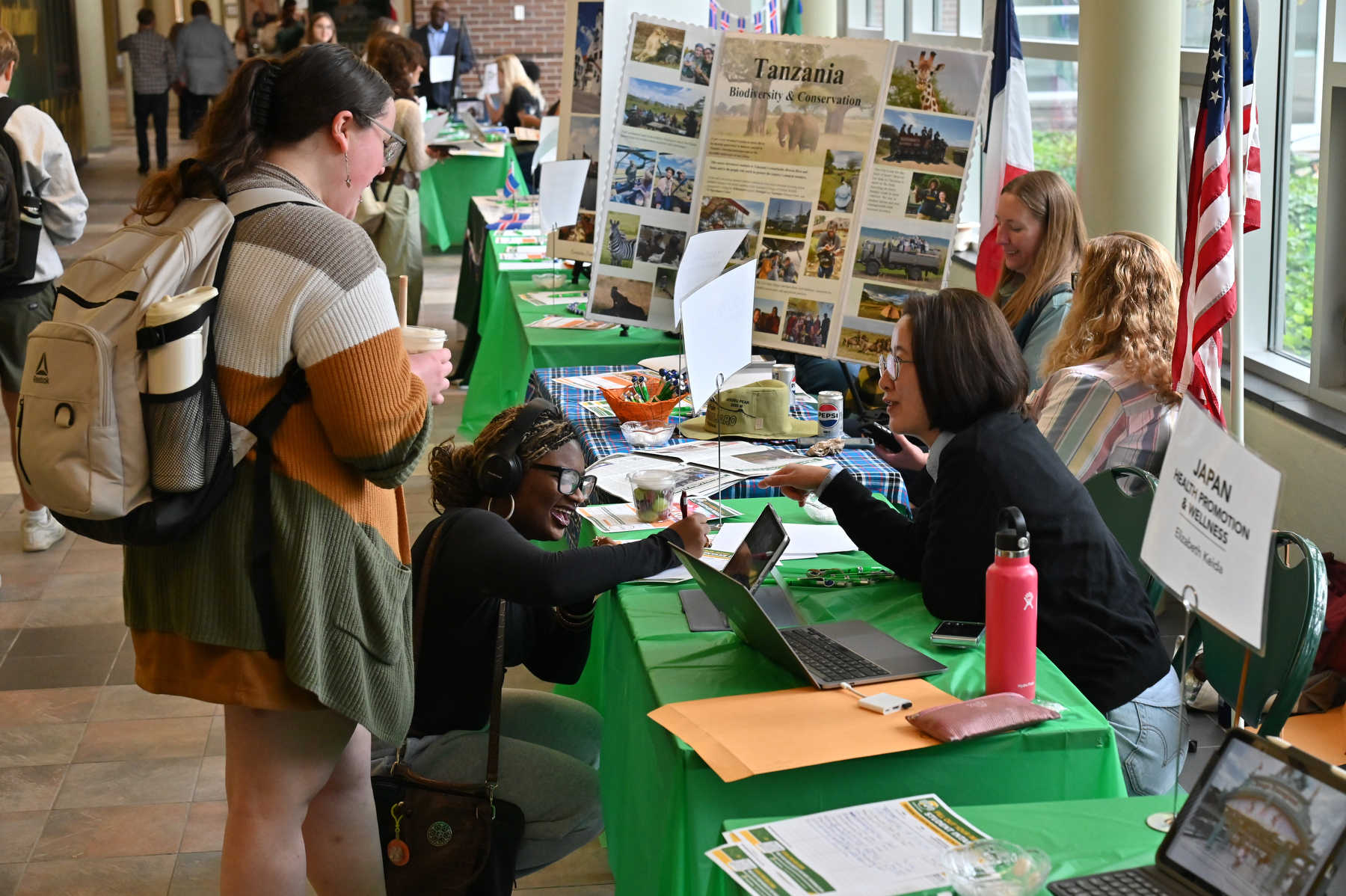 The Fall Study Abroad Fair organized by the the Office of Education Abroad, International Student Services was held Sept. 24 along the Marano Campus Center main concourse where interested students could learn about opportunities, including faculty-led programs (one to three weeks), winter and summer sessions, semester and year-long options, and global internships. Pictured is Woomi Shim, a faculty member in the Communication Studies Department, representing the study in Japan program.
