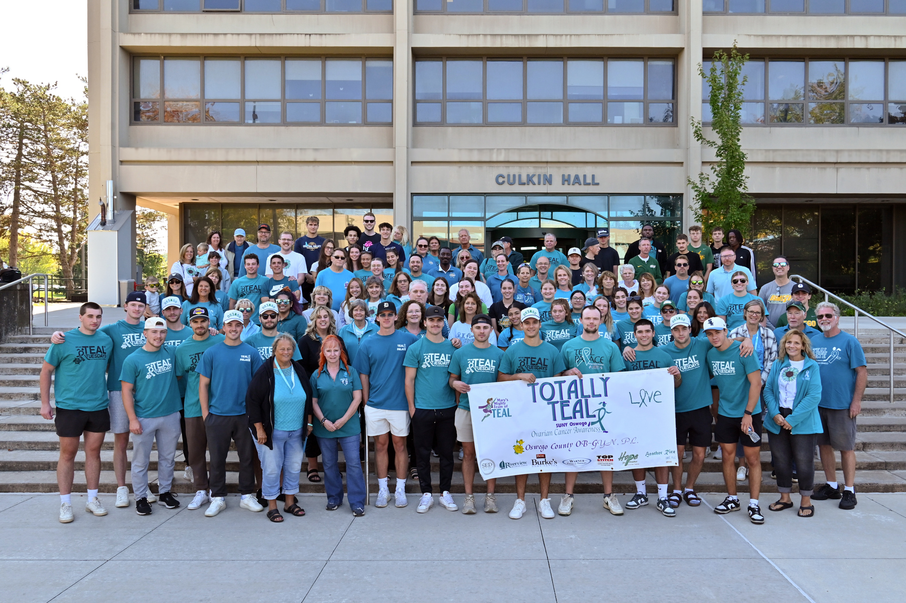 The campus community gathered Sept. 30 for the annual Totally Teal walk and remembrance outside Culkin Hall. The event hosted by SUNY Oswego’s State Employees Federated Appeal (SEFA) goes Totally Teal each year in support of Ovarian Cancer Awareness Month. Funds support Peaceful Remedies, a local charity founded by the late Mary Gosek, a SUNY Oswego employee who fought the disease and played a key role in launching the campus campaign.