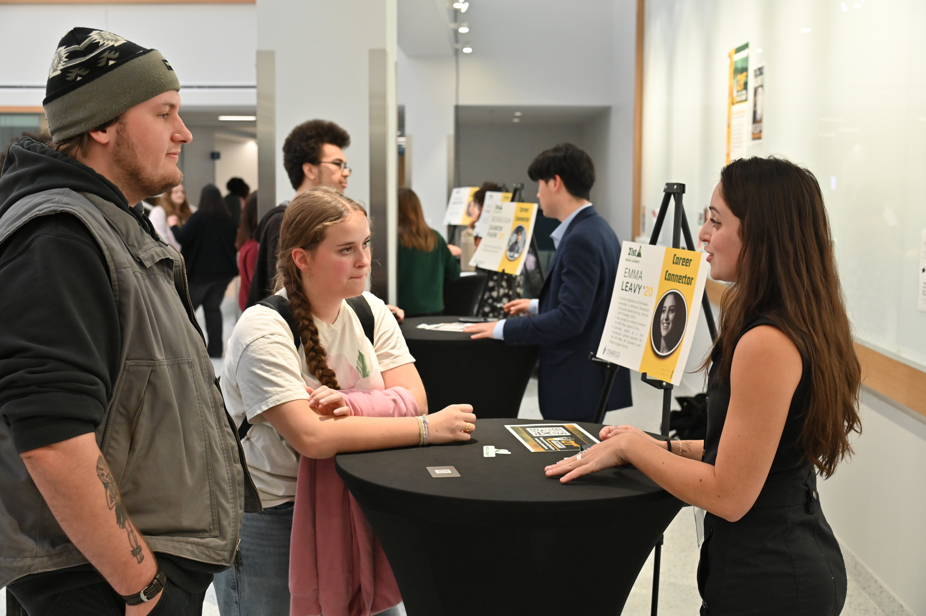 The Career Connectors Networking Event was held in the Hewitt Hall collaborative corridor. Emma Leavy (foreground right) '20, filmmaker/camera operator for the New York Mets and New York Islanders; and Seung Guk Damon Park (in back) '20, a freelance video editor and master at Park’s Martial Arts. 