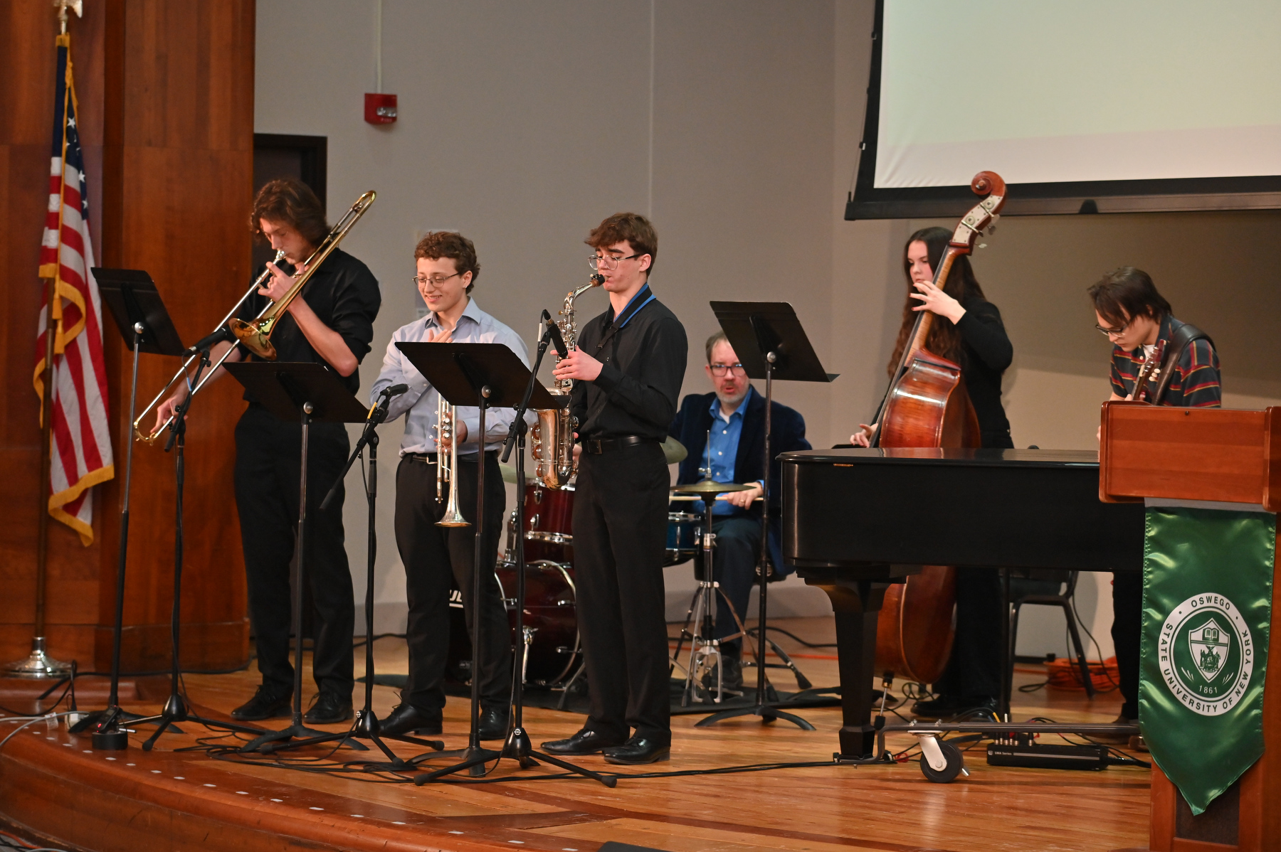 The annual Martin Luther King Jr. Celebration included a classic jazz piece by John Coltrane titled “Mr. P.C.,” performed by Eric Schmitz, professor of music (on drums), with Aaron Wrafter (alto sax), Trey Woolwine (trumpet), Charlie Cherchio (trombone), Joe Salazar (guitar) and Mya Roper (bass). 