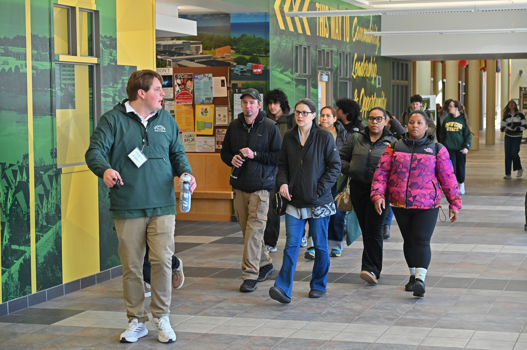 Admitted Student Day allows students who have been accepted to SUNY Oswego an opportunity to see the campus, learn more about the Oswego experience and take tours, such as this one led by student Teddy Hodownes going through the Marano Campus Center on March 27.