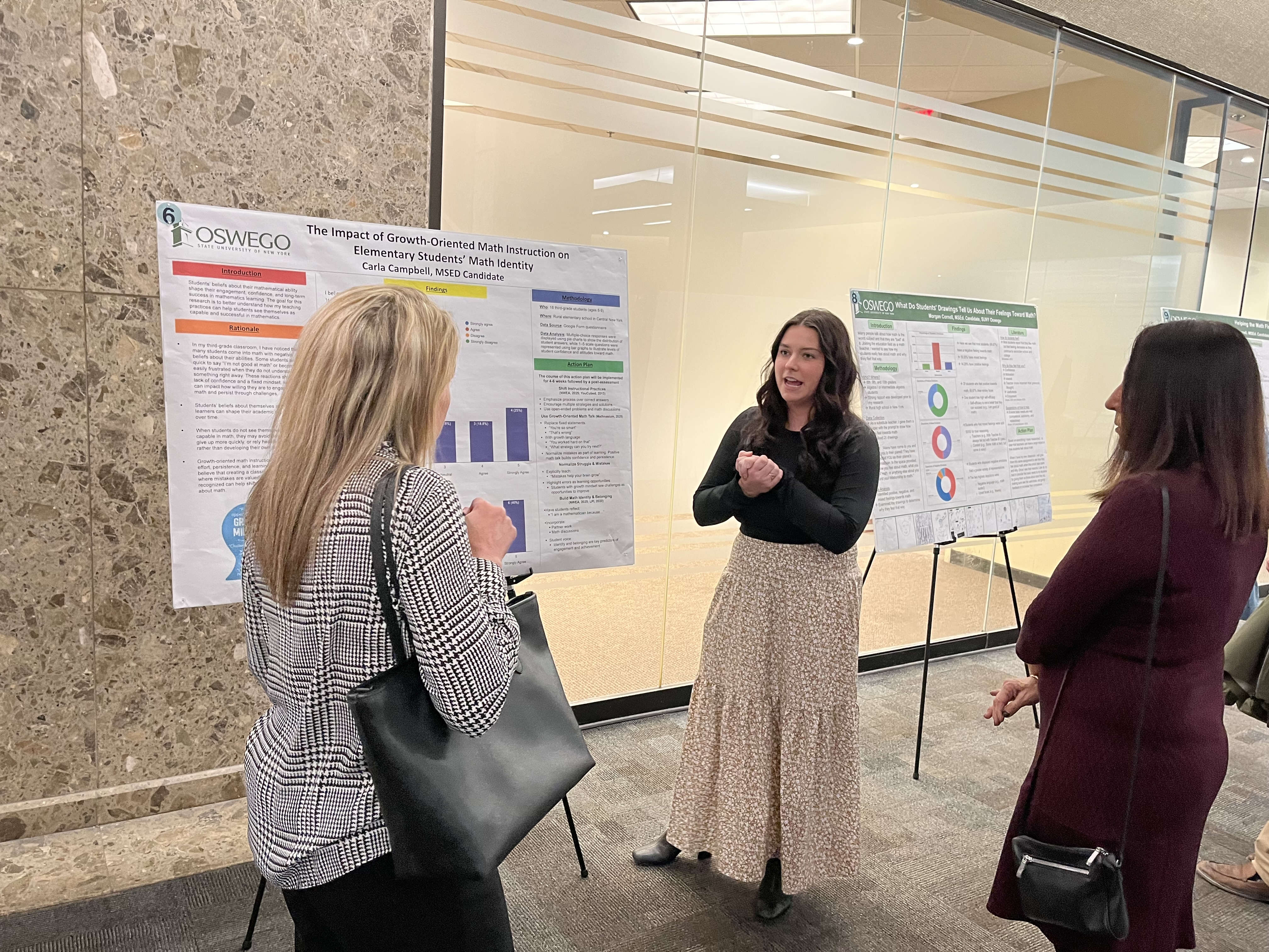 SUNY Oswego at Syracuse hosted a Quest preview poster session on Tuesday, April 21. More than 30 posters across education and biomedical health informatics showcased concepts including early disease detection, assistive technology and strategies for more effective teaching. Poster presenters include Carla Campbell discussing “The Impact of Growth-Oriented Math Instruction on Elementary Students’ Math Identity.”