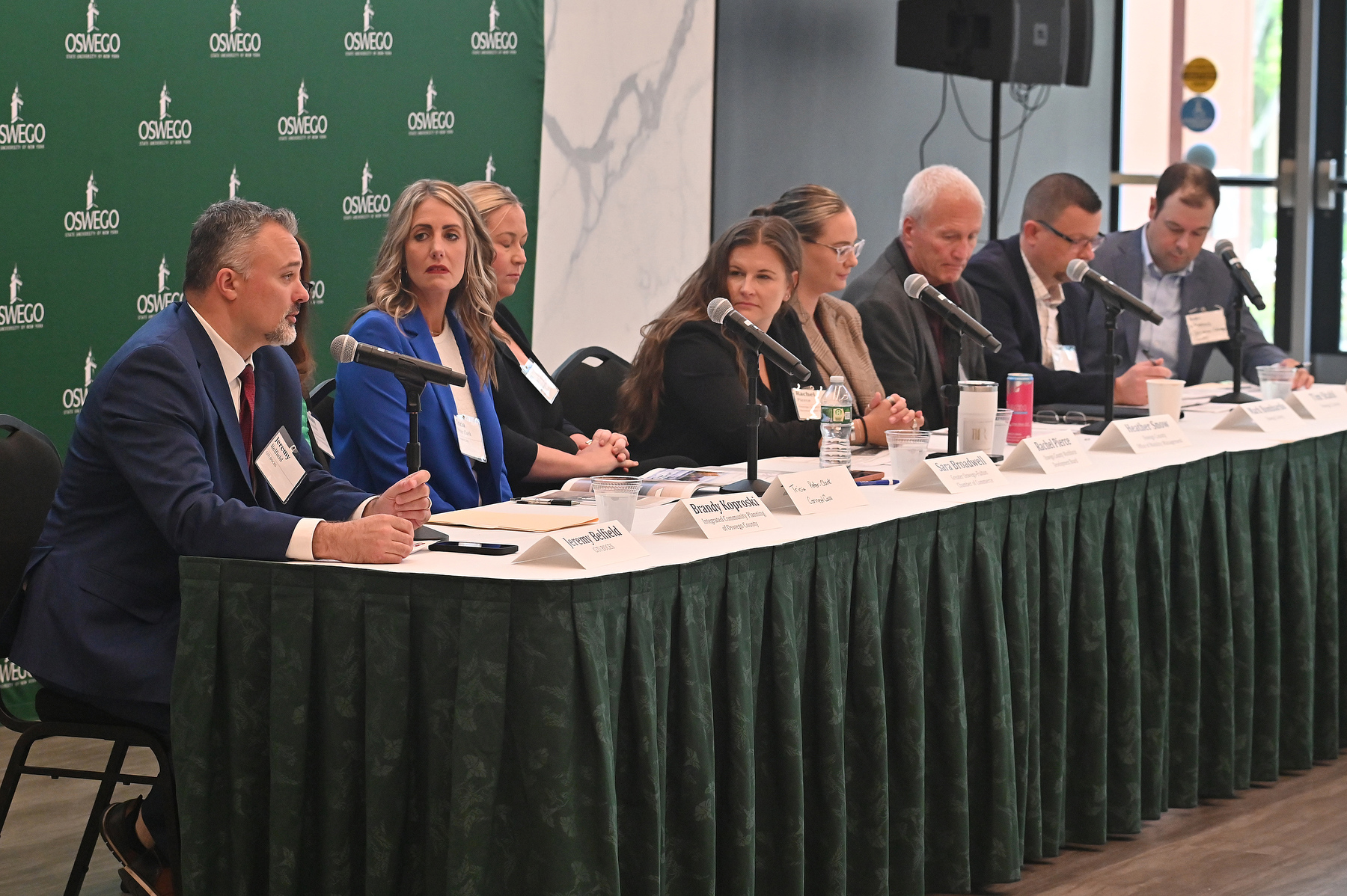 The Oswego County Micron Strategy Steering Committee and workgroup members presented updates on Oswego County’s preparations for Micron Technology’s ongoing transformative investment in Central New York. Jeremy Belfield (pictured at left) from CiTi BOCES speaks during the committee's third annual summit, held June 15 in Hewitt Hall.