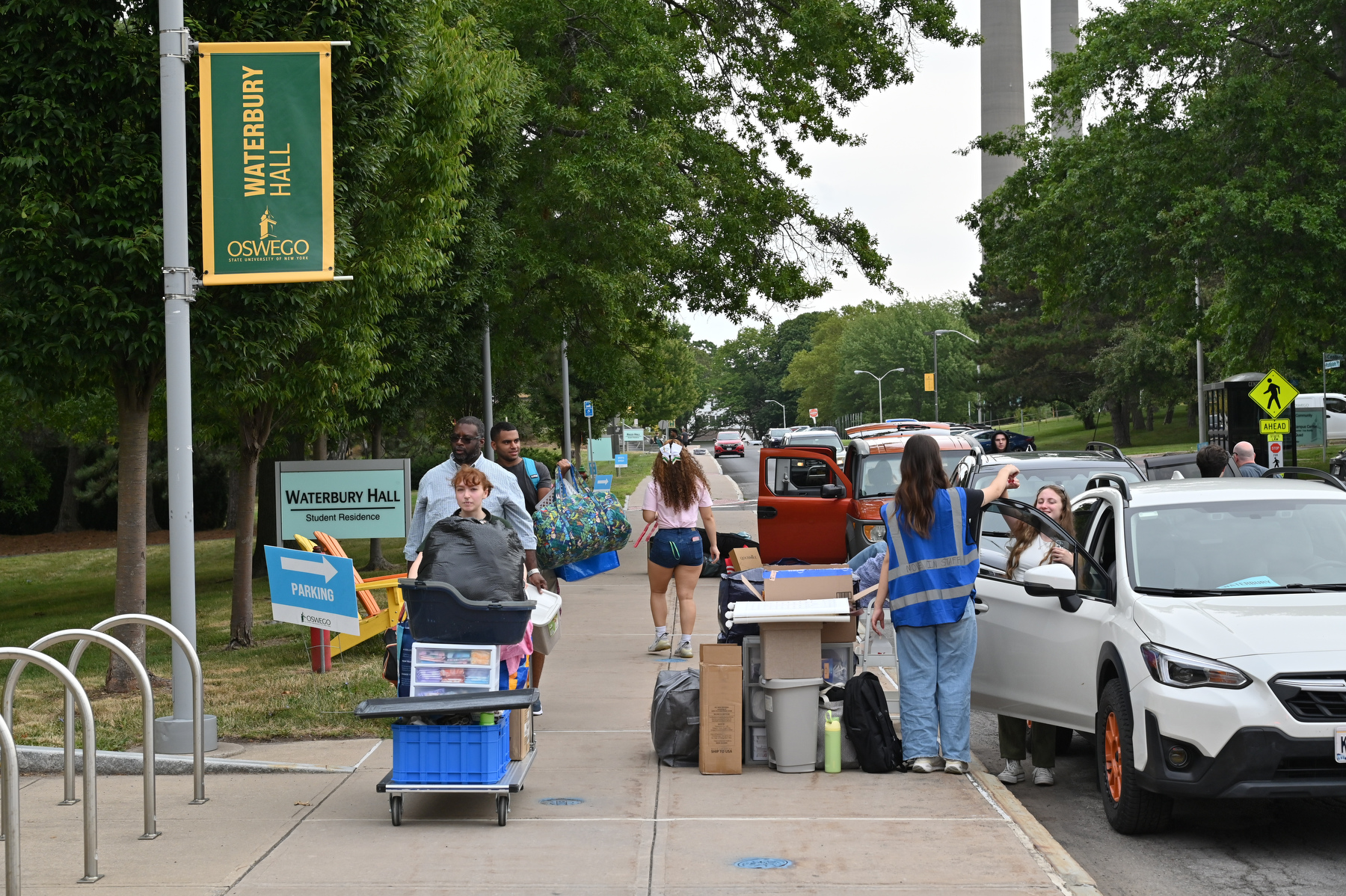 A large number of new Lakers are shown moving into their new homes in Waterbury Hall on Aug. 20.