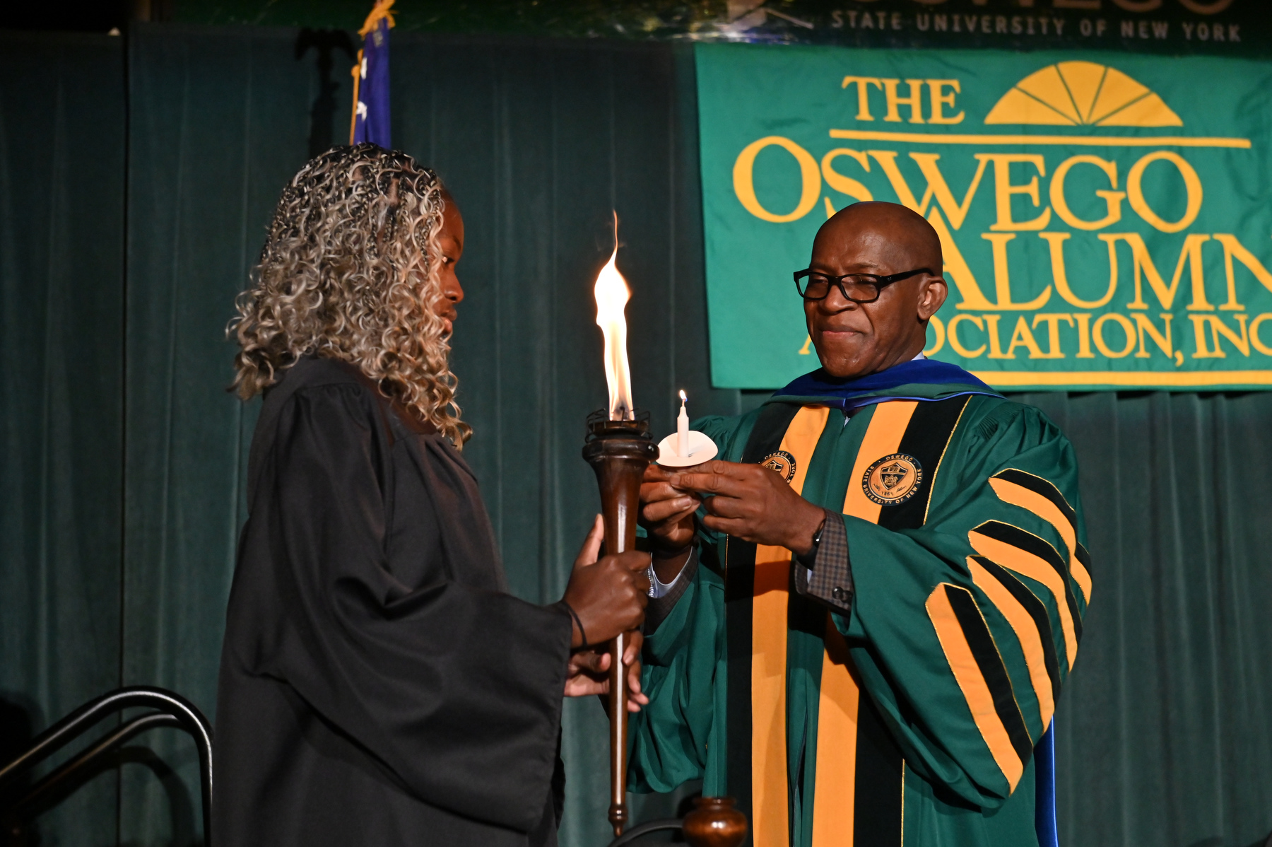 The university's 37th annual Welcoming Torchlight Ceremony on Aug. 20 welcomed new Lakers in the Deborah F. Stanley Arena and Convocation Hall, Marano Campus Center. Student Association President Precious James served as Torchbearer, lighting the candle held by President Peter O. Nwosu prior to passing the flame among students, faculty and staff.