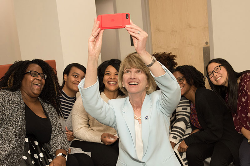 SUNY Chancellor Kristina M. Johnson takes photo with education students