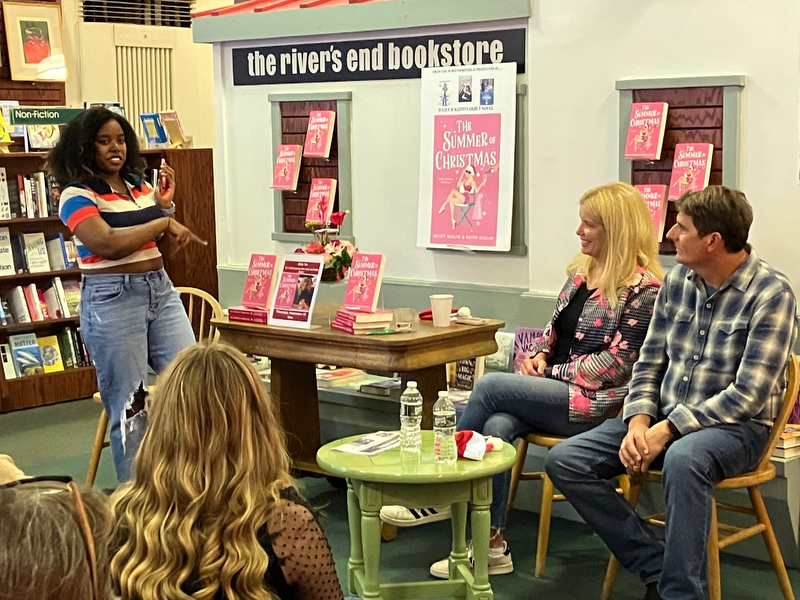 Juliet and Keith Giglio gave a talk and booksigning to a full house for their new novel “The Summer of Christmas” on Sept. 22 at River’s End Bookstore in downtown Oswego. Senior creative writing major Cambria Gordon (standing at left) asked questions and served as moderator for the event.