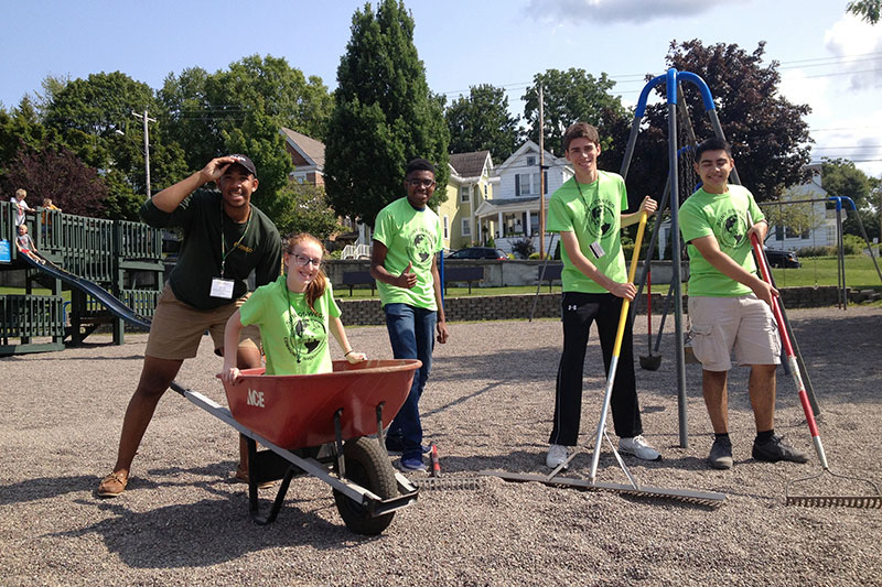 Students volunteering in playground