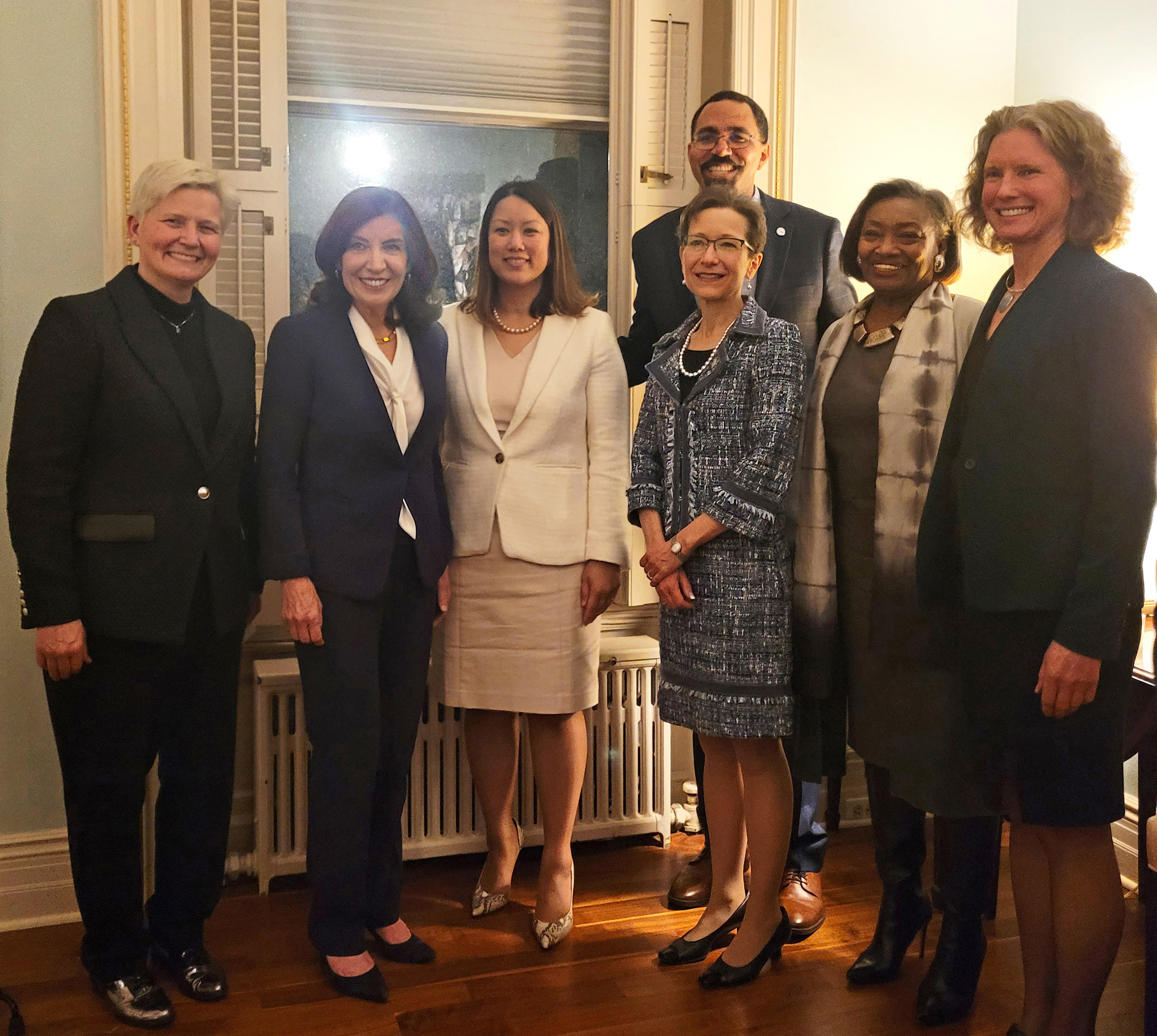 The March 27 Women’s History Month reception in Albany allowed leaders from across the state to meet and network. From left are SUNY Oswego Officer in Charge Mary C. Toale, Gov. Kathy Hochul, Commissioner of the New York State Office of General Services Jeanette M. Moy, SUNY Chancellor John B. King Jr., SUNY Geneseo President Denise Battles, State Senator and Majority Leader Andrea Stewart-Cousins and SUNY Empire President Lisa Vollendorf.