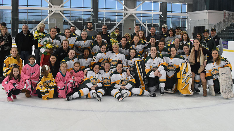 Laker women's hockey team, families, coaches, fans celebrate