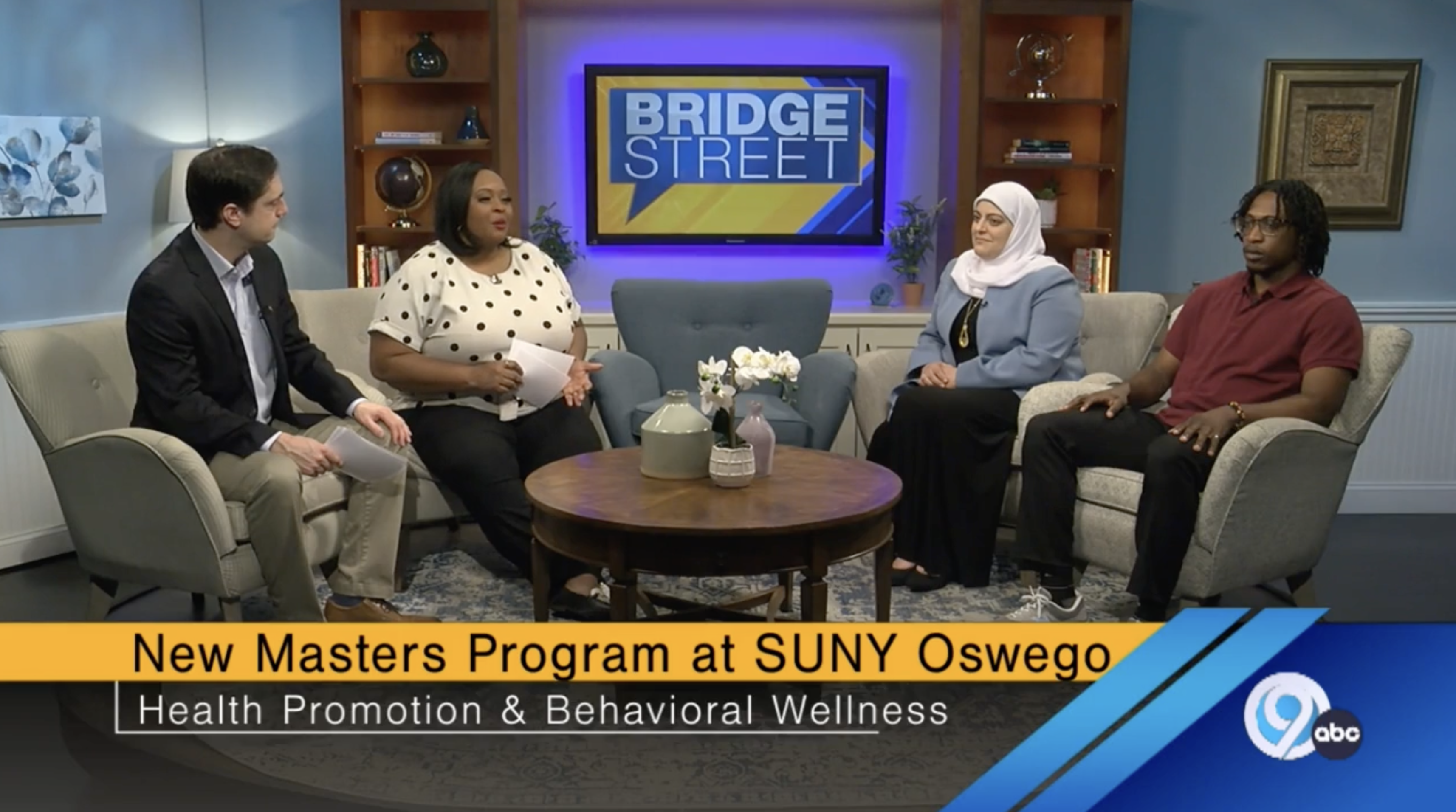 faculty and student talking on bridge street morning show