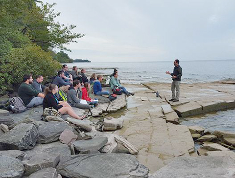 Students meeting at lake for class